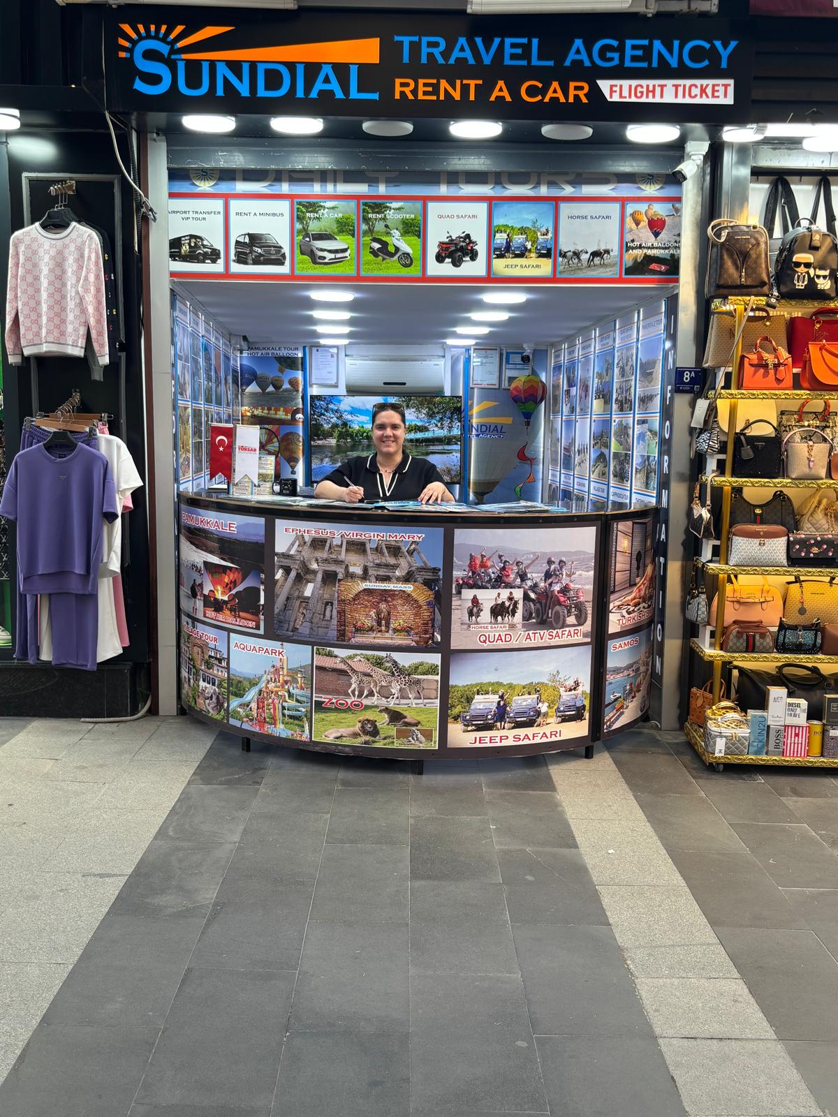 Sundial Travel Agency office front in Kuşadası with Yusuf Gündüz at the reception